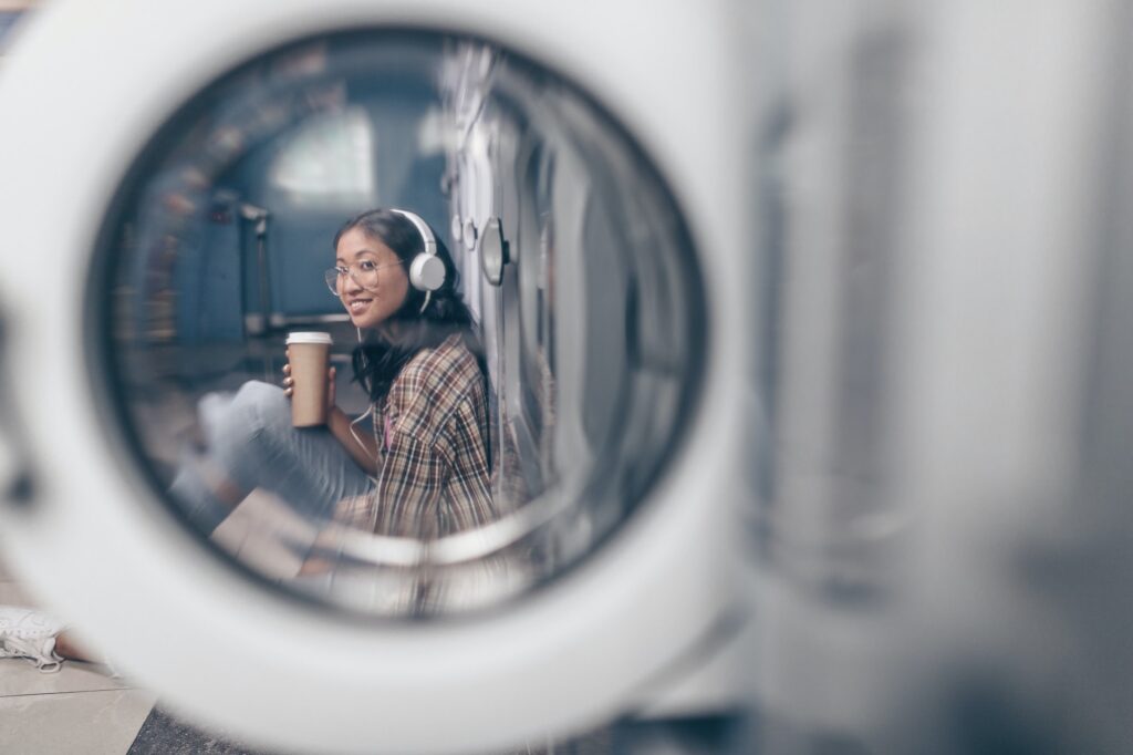 Smiling girl in laundry